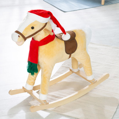 Schaukelpferd, mit Weihnachtsmütze & Schal
