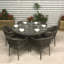 Lilia 6 - Person Wicker Patio Dining Set with Round Table , Cushions Included
