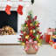 Mini arbre de Noël 24 pouces avec lumières, arbre de table artificiel pré-éclairé avec arc et boules, baies rouges