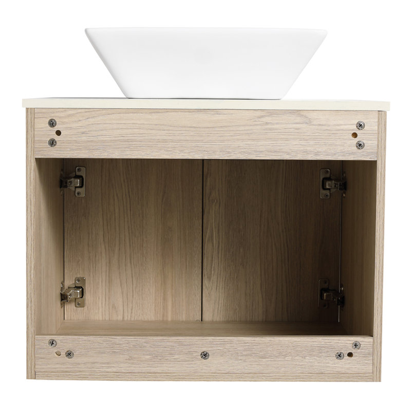 Meuble-lavabo de 24 po avec lavabo en céramique. Style mural en chêne blanc. Porte à fermeture en douceur. Rangement généreux. Poignée en métal. Ardoise moderne 24 po. Chêne. Bassin et abondance de sensation luxueuse