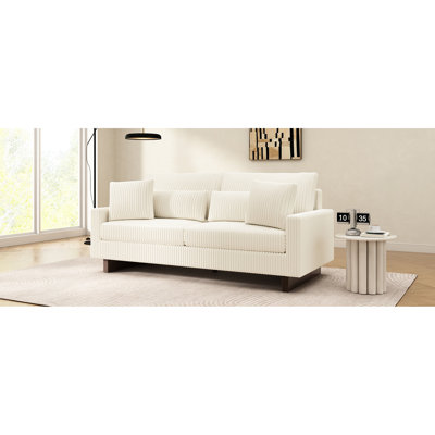 Élégant canapé en velours côtelé beige, design moderne compact pour le salon