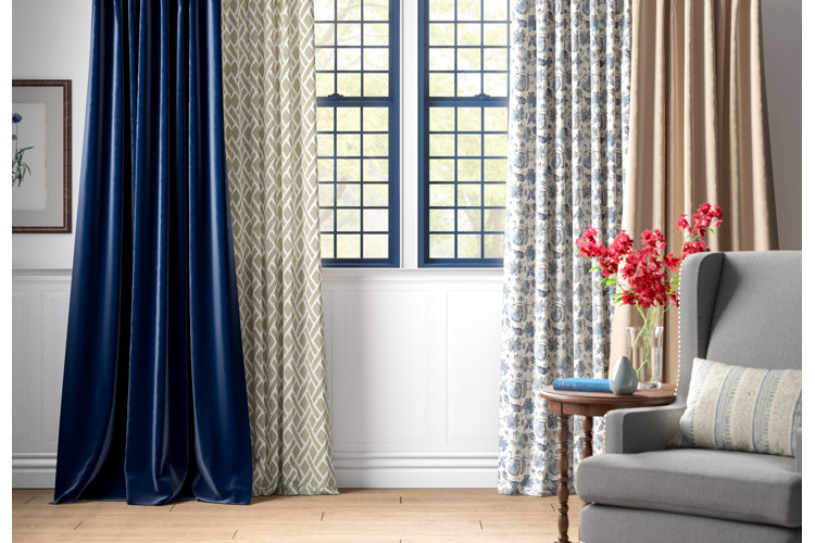 traditional living room displaying four different patterned curtains
