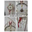 Horloge murale dorée en forme de coquillage