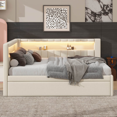 Entirely Upholstered Platform Bed Boasting USB Ports, LED Lighting, And A Trundle