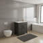 Meuble-lavabo de ferme gris de 30 pouces avec lavabo encastré en céramique et robinet, porte de grange et unité de rangement séparée.