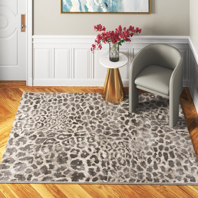 Ronnie Animal Print Taupe, Beige, and Gray Area Rug
