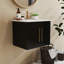 Meuble-lavabo mural de 24 po avec lavabo en céramique, charnières à fermeture douce et grand espace de rangement noir brillant
