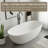63" Stone Resin Freestanding Bathtub, Elegant Oval Stand Alone Soaking Tubs, Solid Surface Bathtub With Drain & Integrated Slotted Overflow Matte White-120328369