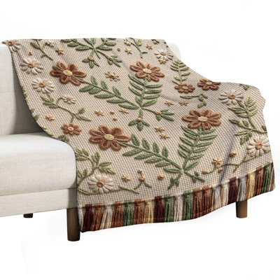 Jeté en flanelle de luxe à motif floral brodé avec des feuilles et des pampilles, une couverture douce et chaude pour le canapé-lit du salon