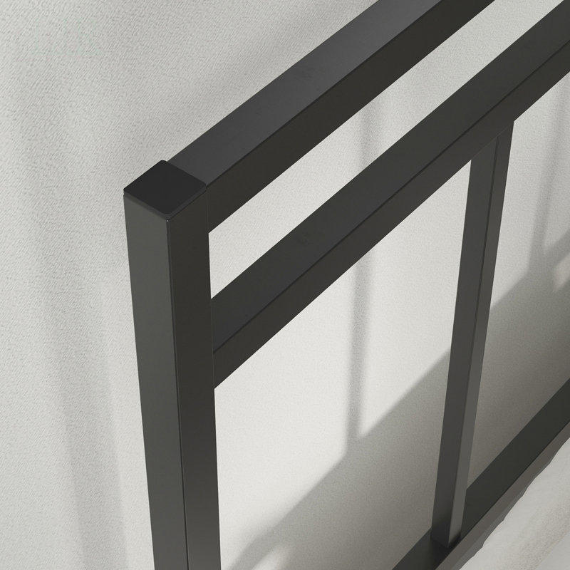 Lit plateforme élégant avec tête de lit simple, conception peu encombrante pour les petites pièces et l'esthétique moderne