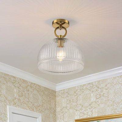 Plafonnier semi-encastré à une lumière, style moderne du milieu du siècle, avec abat-jour en verre transparent cannelé.
