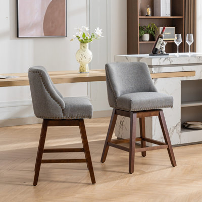 Counter Height Swivel , 26'' Seat Height. Of 2 Gray Upholstered Bar Stools With 360 Rotatable Feature. Soft Foam And Steel Spring Filling For Comfortable Sitting. Curved Back Support. Made