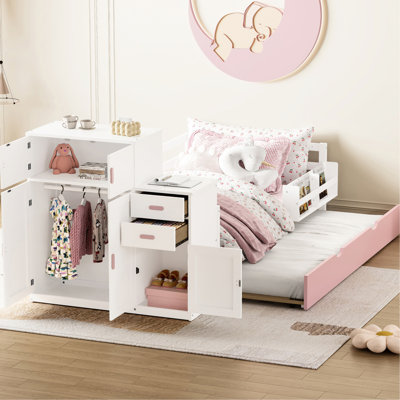 Lit simple en bois avec lit gigogne intégré, bibliothèque pour échantillons et garde-robe rose blanc mobile pour un environnement de bureau efficace
