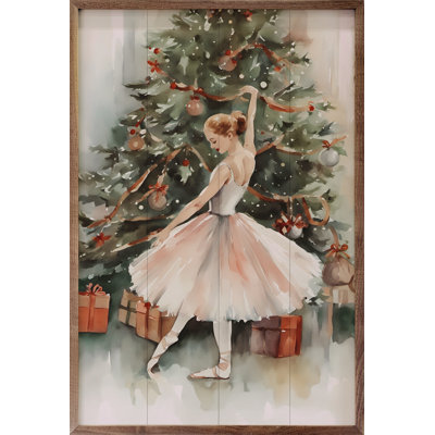 Danseuse près d'un arbre de Noël
