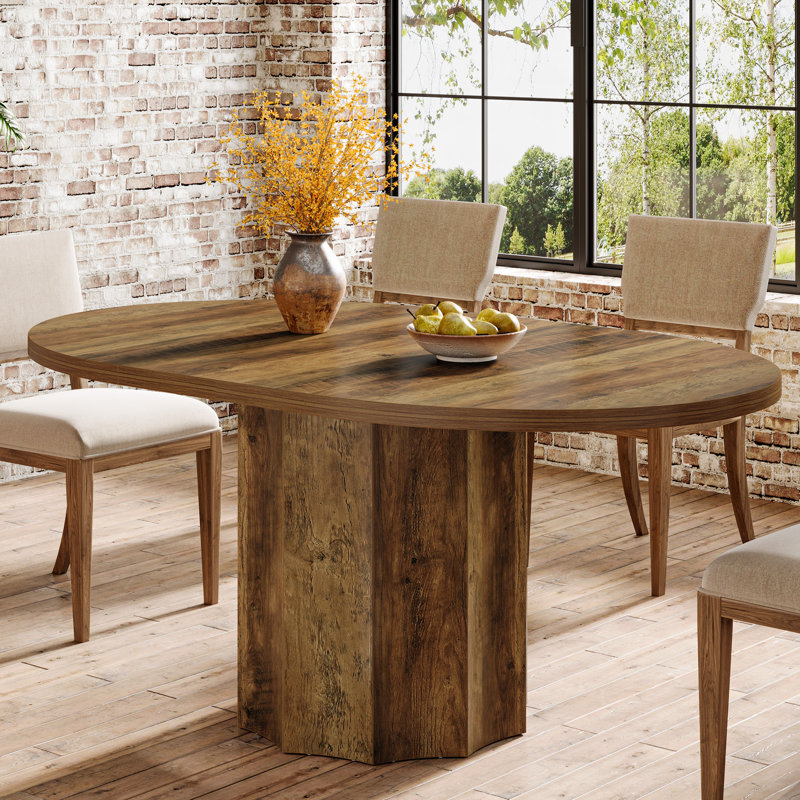 55-Inch Oval Dining Table with Wave-Shaped Base