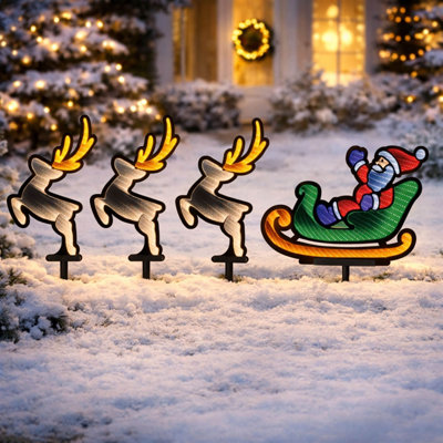 Père Noël et traîneau lumineux Ekkolight