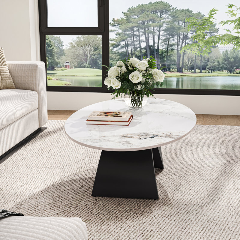 Table basse 51 po blanche en faux marbre avec base en acier au carbone en forme de N noire, luxueuse table basse ovale pour la maison et le bureau
