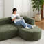 Canapé modulaire incurvé de luxe en tissu chenille, design minimaliste vert pour le salon