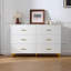Commode 6 tiroirs blanche avec poignées dorées et pieds en métal