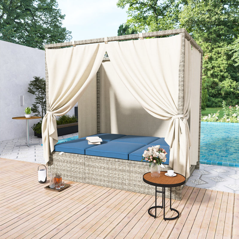 Lit de jour d'extérieur en osier avec auvent et coussins bleu foncé, meubles de patio avec sièges réglables