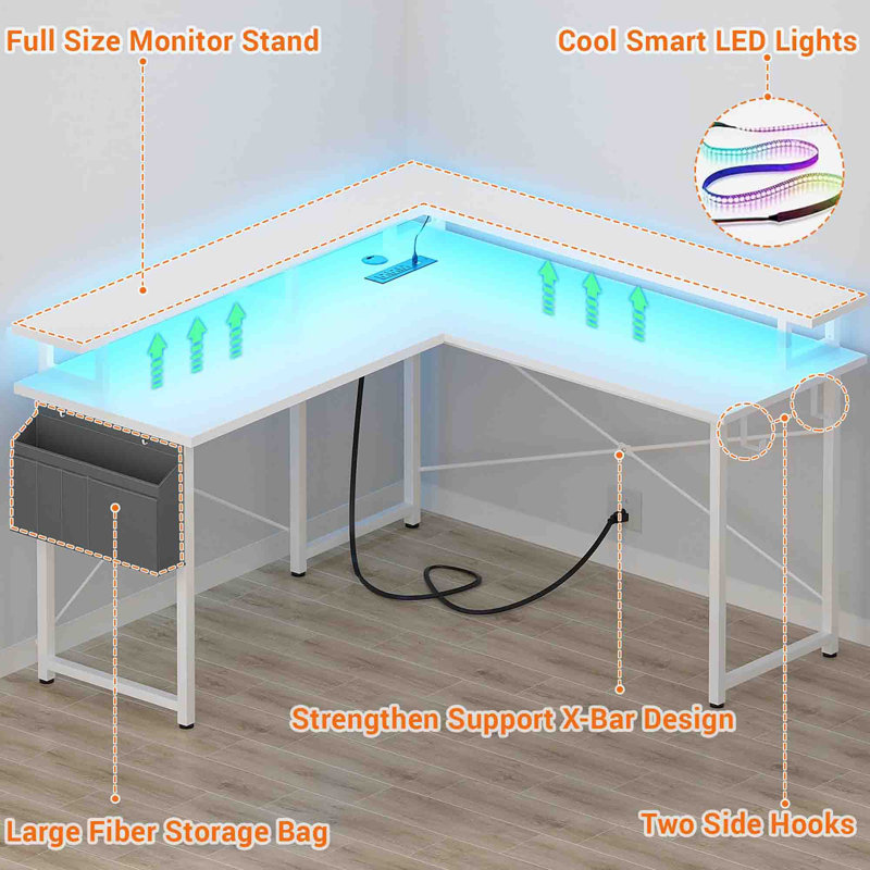 Black L-Shaped Gaming Desk with Power Outlets and Storage