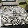 Christoper Hand Tufted Wool Animal Print Rug