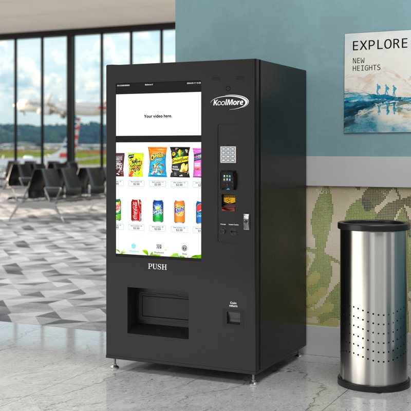 Refrigerated Snack Vending Machine In Black With 48 Slots Featuring Ample 49 Inch Touch Display, Bill Acceptor, Credit Card Reader, Wifi and 4G Connectivity