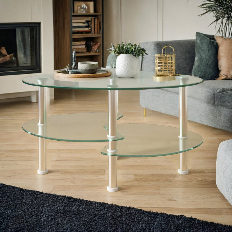 Table basse Mollen, Plateau transparent / base argentée