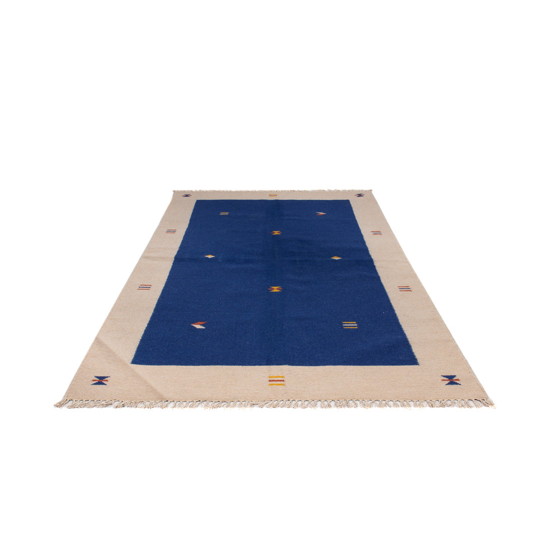 Handgewebter Teppich Aminata aus Wolle in Blau/Beige