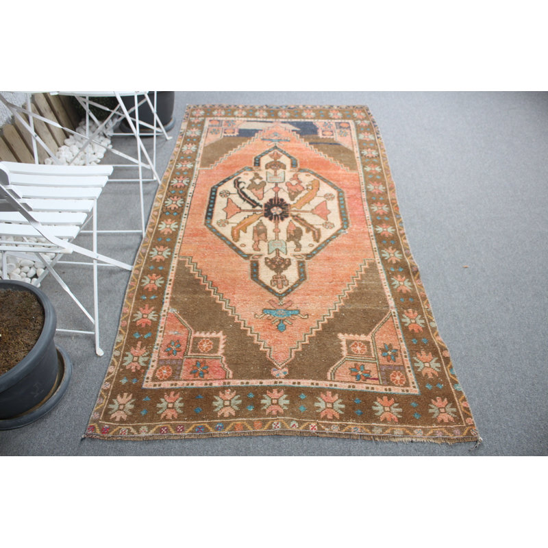 Tapis turc rétro de couleur orange vif parfait pour rehausser l'ambiance du salon