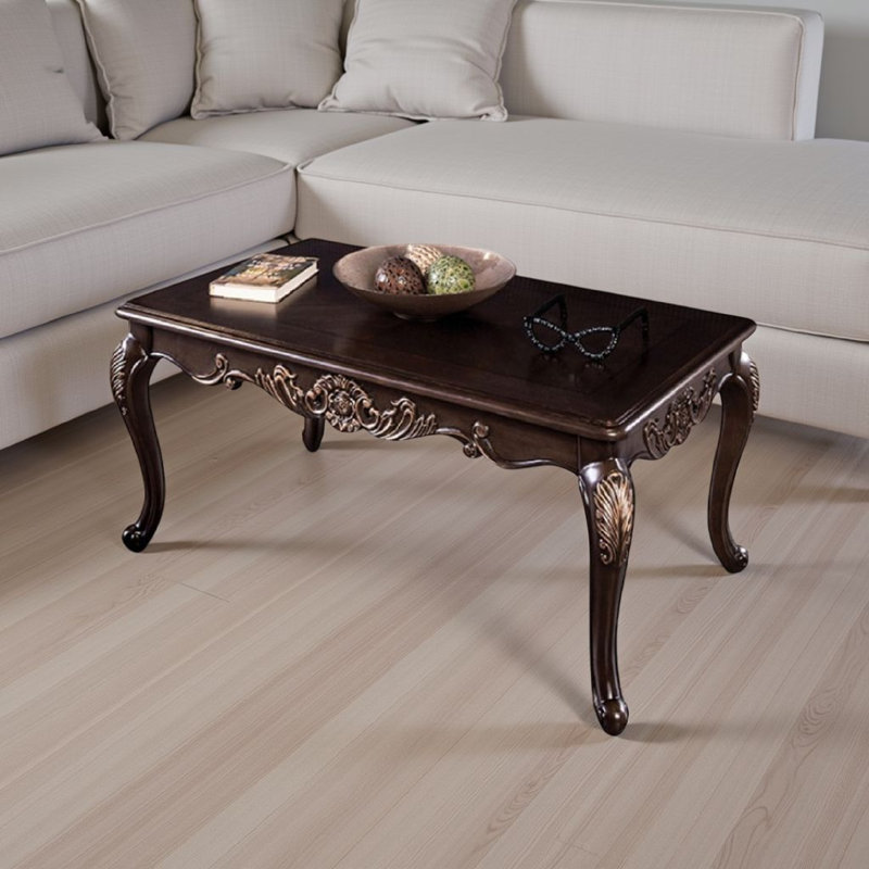 Table basse Astor, bois brun cerise foncé de 52 po, détails sculptés