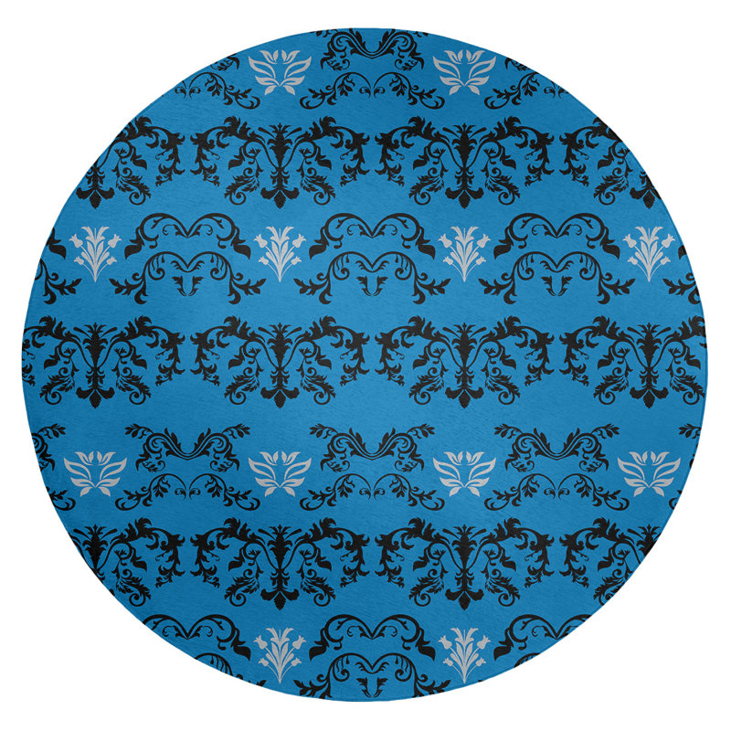 Tapis rond bleu damassé à motif baroque
