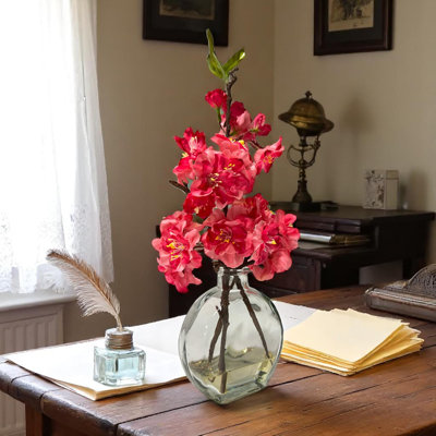 Fuchsia Cherry Blossom in Flat Round Glass Vase