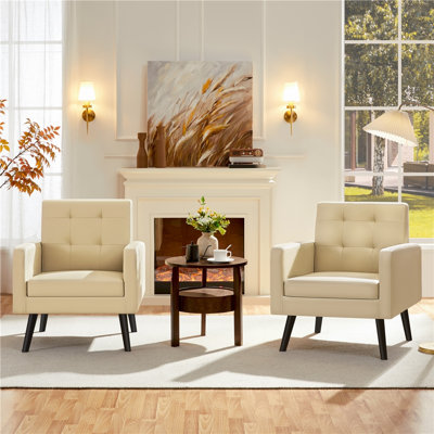 Fauteuil moderne en similicuir capitonné