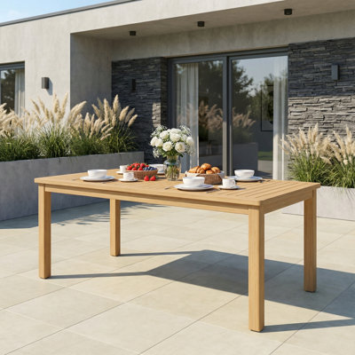 Table de salle à manger d'extérieur en bois massif de 69 po Itzabelle