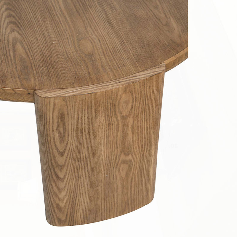 Table basse ronde avec pieds incurvés