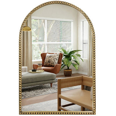 Miroir doré antique avec cadre perlé