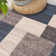 Tapis bleu touffeté à motif géométrique Allyne
