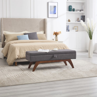 Banc de rangement moderne avec pieds en bois massif, parfait pour le bout du lit ou le vestibule