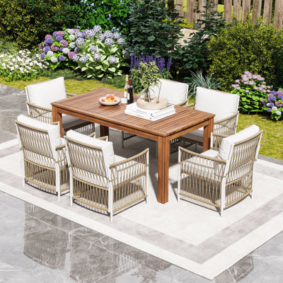 7Pcs Patio Dining Set with 67" Acacia Wood Table and 6 Handwoven PE Rattan Cushioned Armchairs