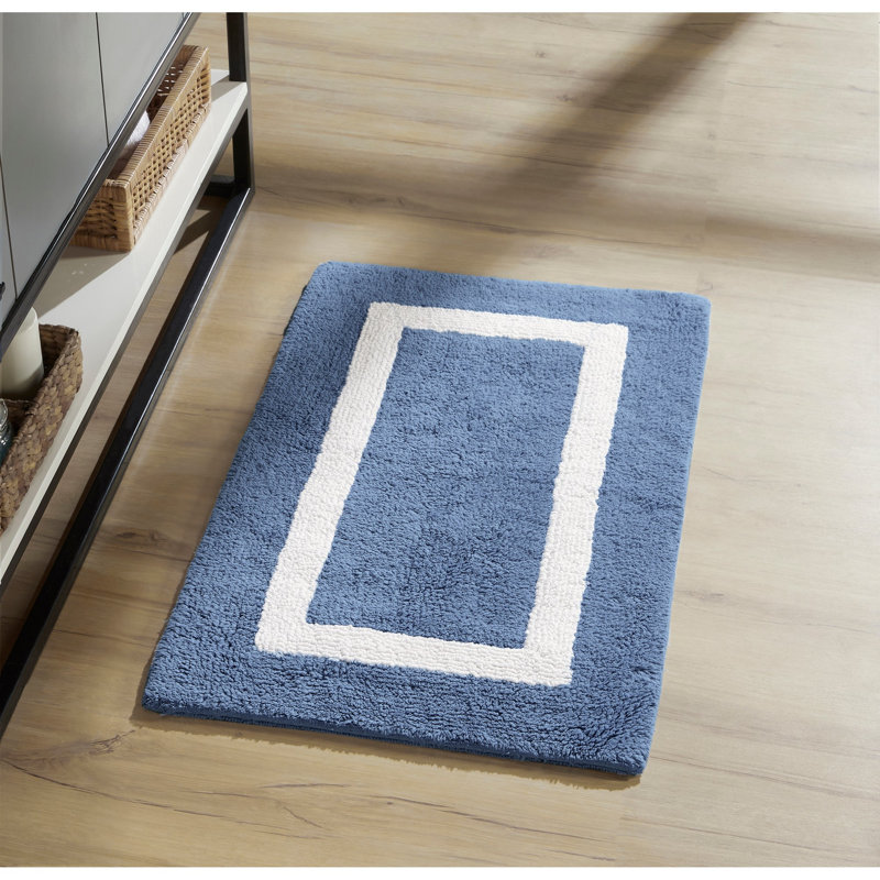 Tapis pour salle de bain réversible 100% coton Widman, doux et super absorbant, lavable à la machine pour la douche, la baignoire et le lavabo, rectangle 21 po x 34 po, bleu foncé / blanc