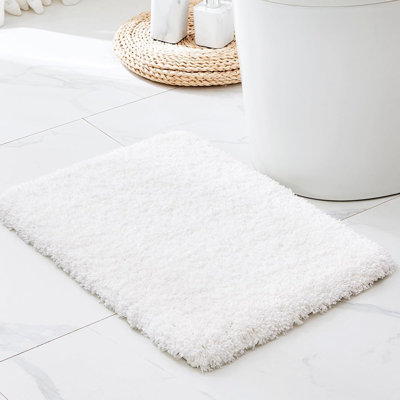 Tapis de salle de bain blanc, petit tapis de bain moelleux antidérapant, tapis de sol moelleux très doux et très absorbant, lavable à la machine pour la douche et la baignoire