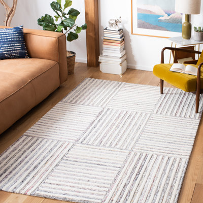 Tapis rayé en laine et coton touffeté à la main Yettem Metro