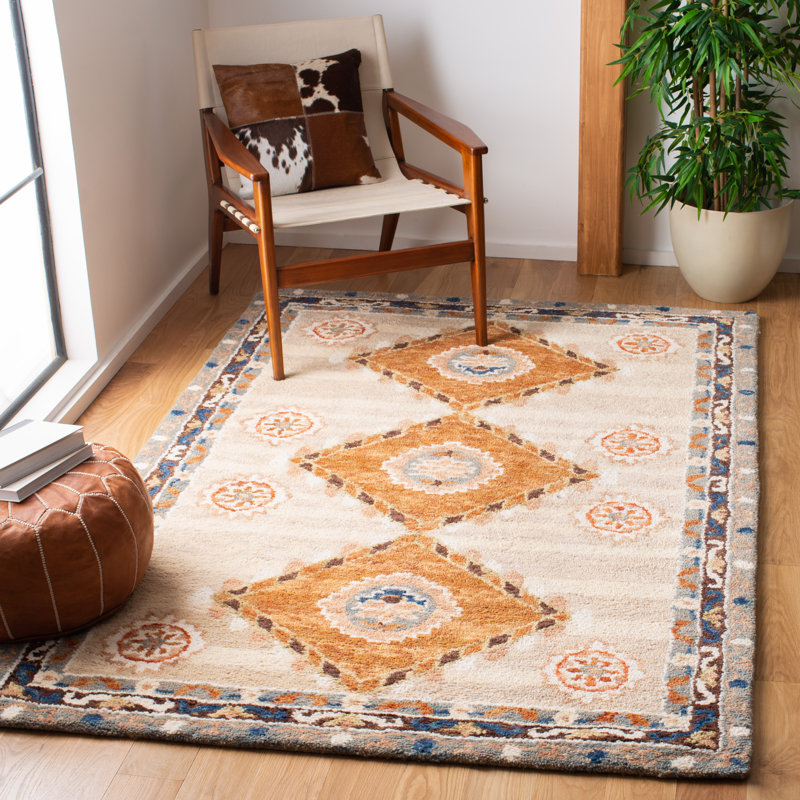 Arkadijus Southwestern Handmade Tufted Area Rug in Brown / Blue, Rectangle 6' x 9'