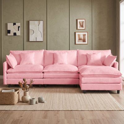 Canapé modulaire en L avec repose-pieds mobile