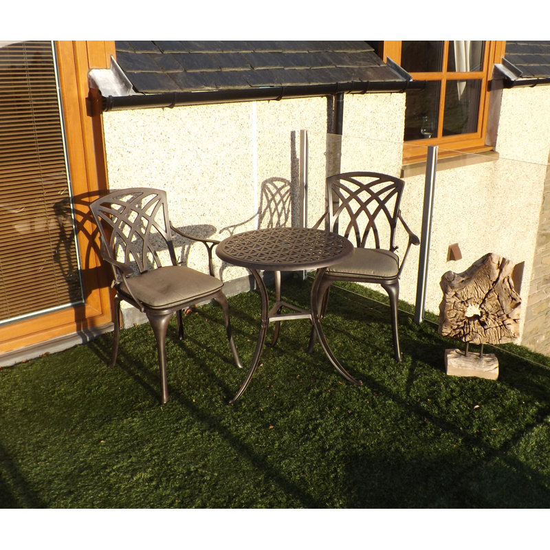 Ryne 2 - Person Patio Dining Set with Round Table , Cushions Included, Bronze