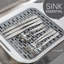 Grille de lavabo hamac auto-drainable