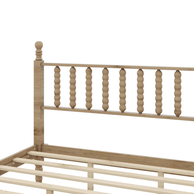 Grand lit plateforme en bois avec tête de lit d'inspiration gourde