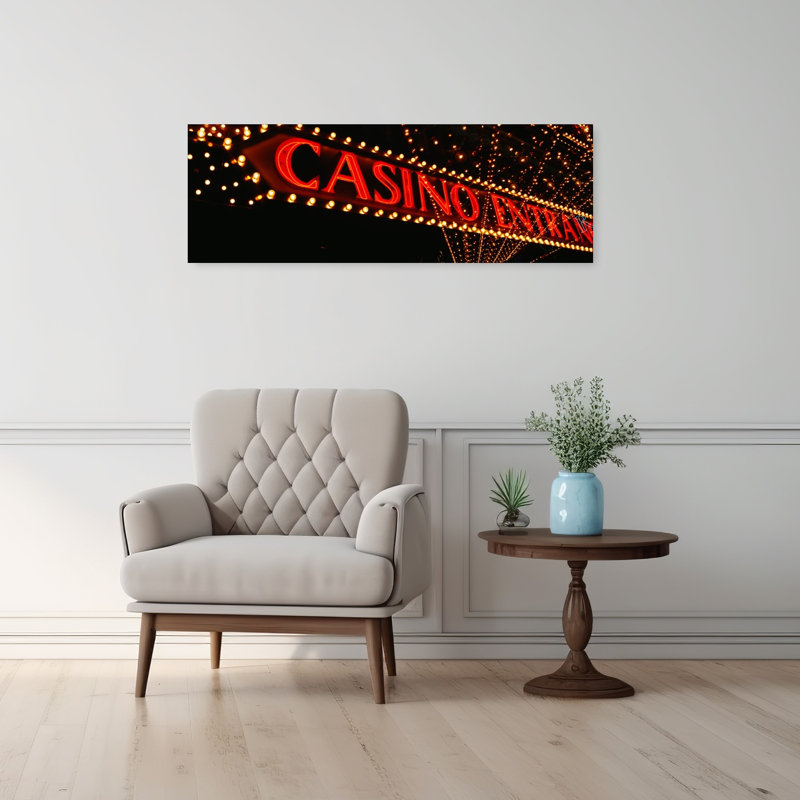 Low Angle View Of Neon Sign Las Vegas Nevada USA by Craig C. Sheumaker - Wrapped Canvas Panoramic Print