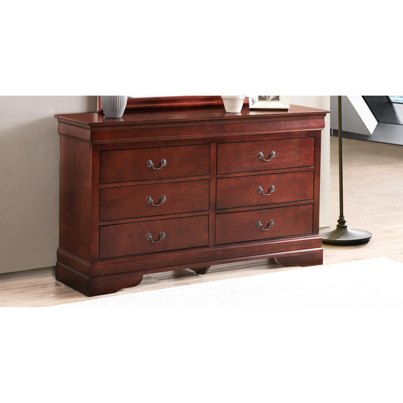 Superbe commode en cerisier avec des pièces en métal attrayantes dans un style traditionnel - Meubles